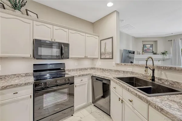 $344,000 | 7409 South Alkire Street, Unit 103, Littleton, CO 80127
