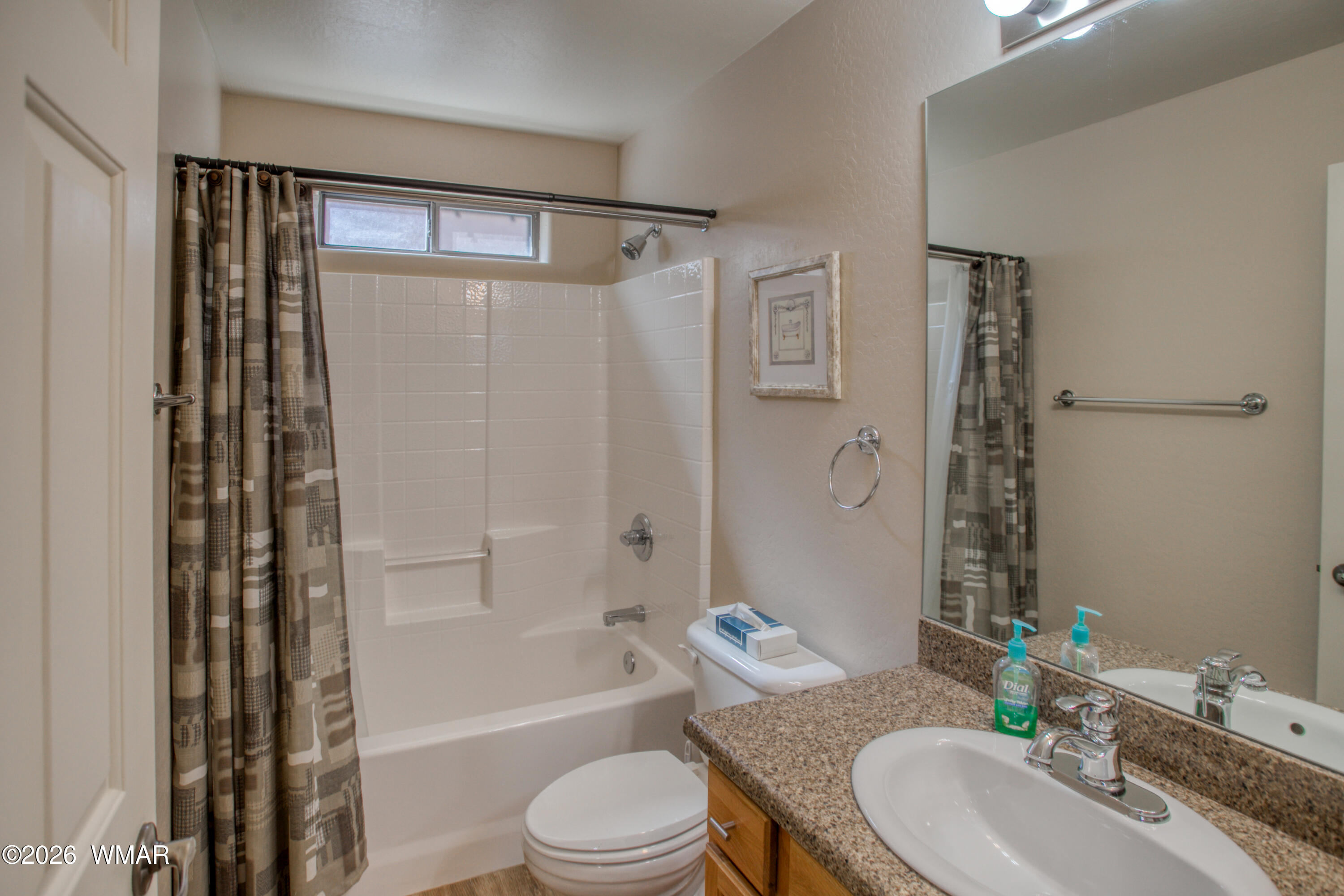 3041 Timber Line Road, Unit 25 Pinetop, AZ 85935 - Photo 18 of 29 a bathroom with a granite countertop bathtub shower sink vanity mirror and toilet