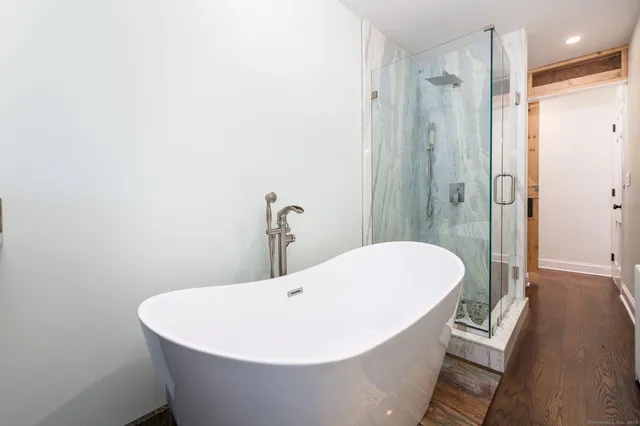 a view of a bathtub in a bathroom