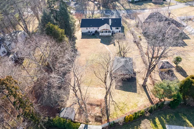 a view of snow on the road
