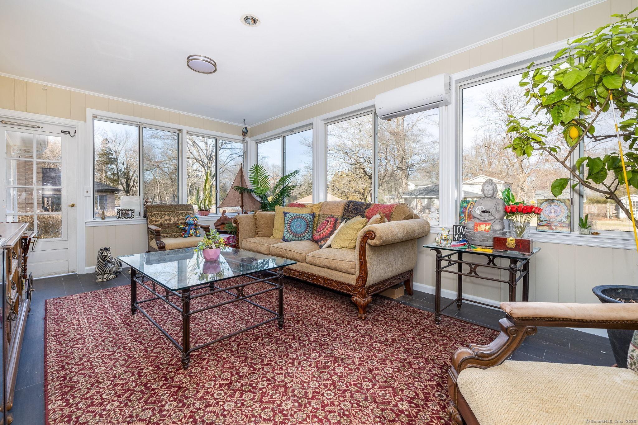 2 Columbine Lane Norwalk, CT 06851 - Photo 10 of 33 a living room with furniture and a large window