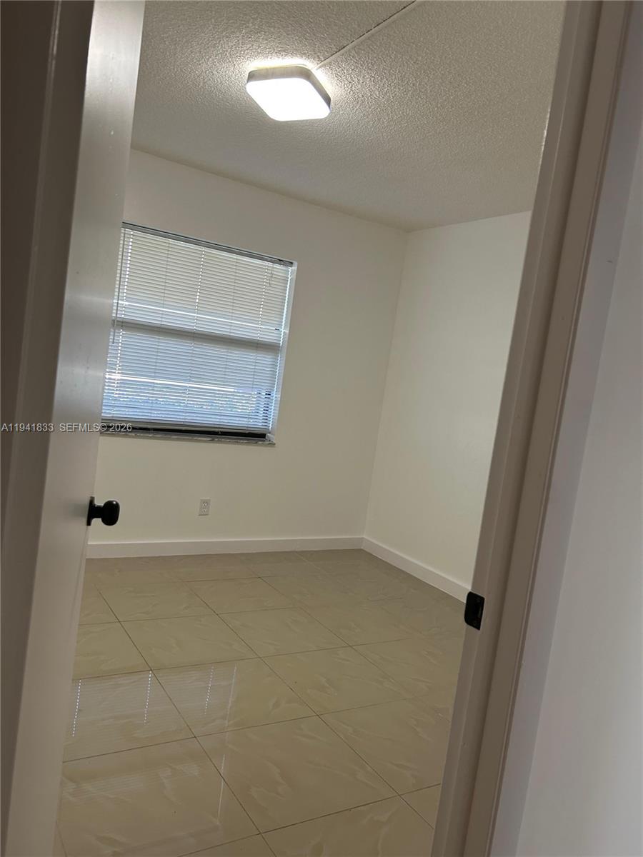 10027 Winding Lake Road, Unit 103 Sunrise, FL 33351 - Photo 6 of 11 a view of a small space