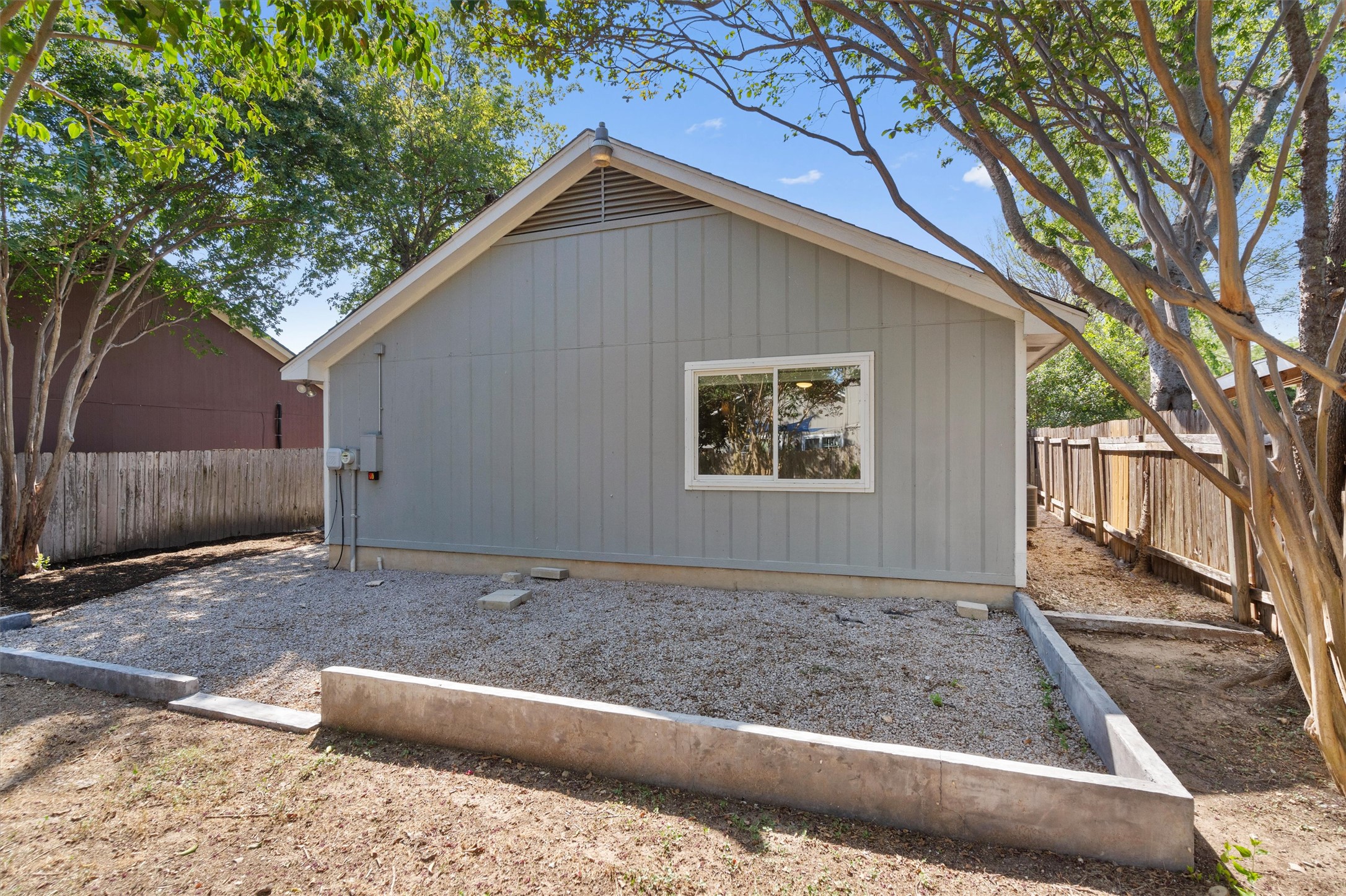12321 Emery Oaks Road Austin, TX 78758 - Photo 25 of 27 A private backyard oasis with mature trees and ready for personalized landscaping.