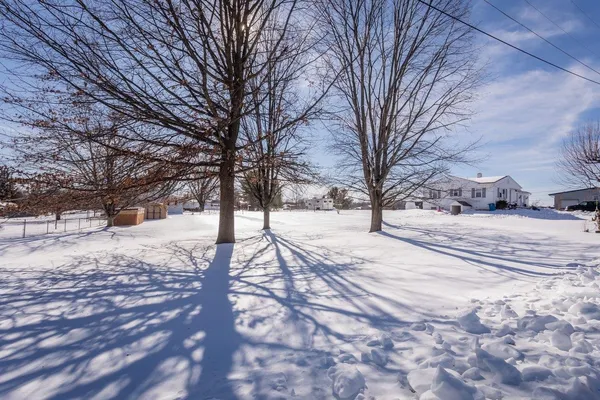 a street view covered with snow