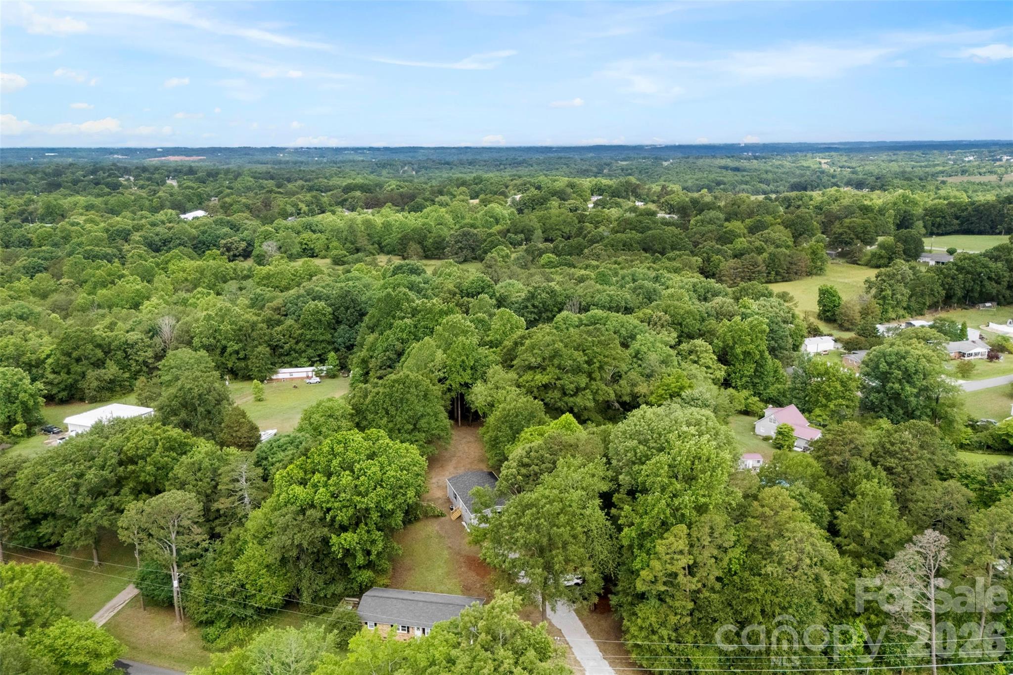 321 Bell Road Kings Mountain, NC 28086 - Photo 27 of 32 a view of a city with lush green forest
