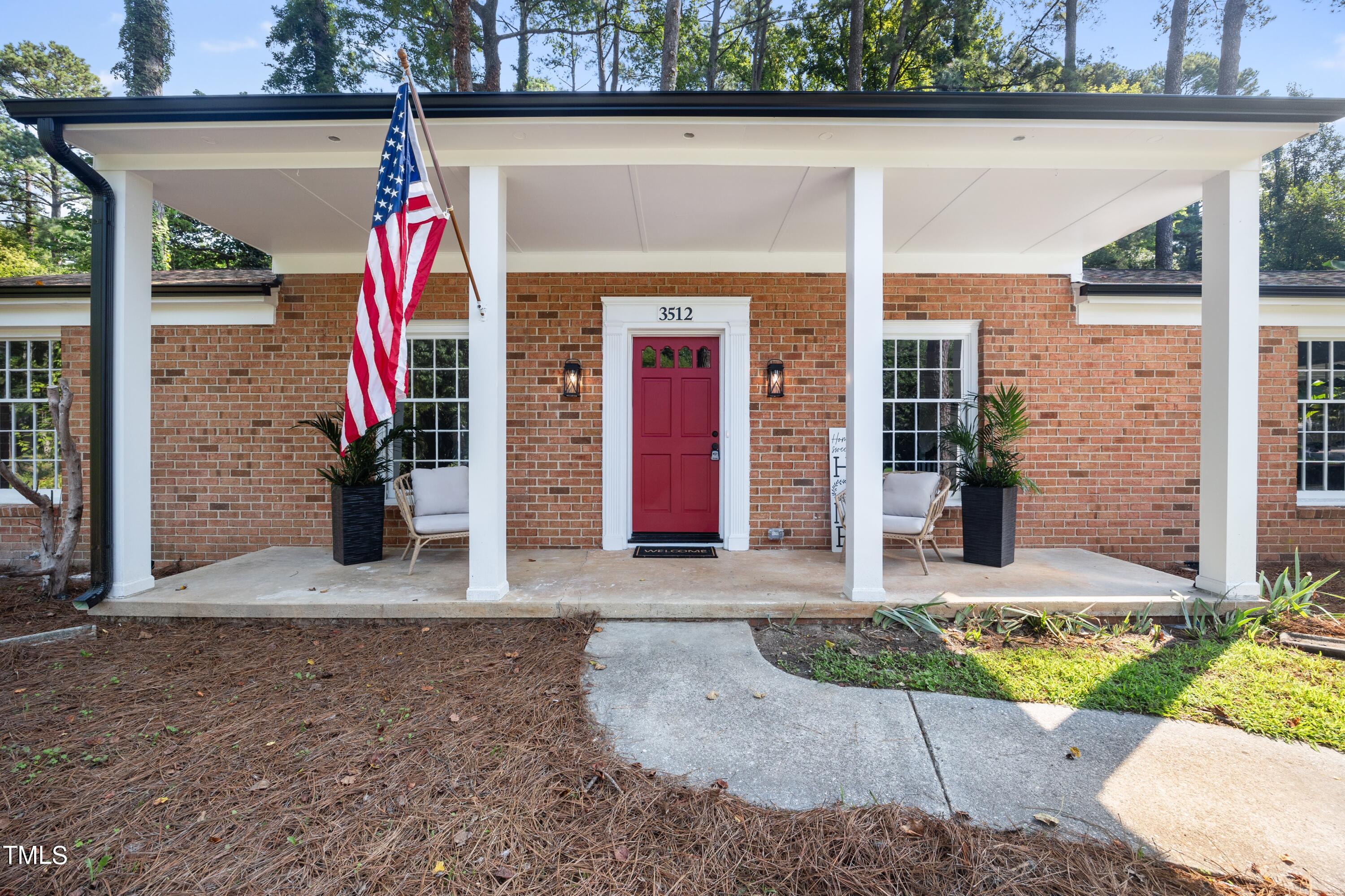 3512 Swift Drive Raleigh, NC 27606 - Photo 2 of 35 a front view of a house with outdoor space