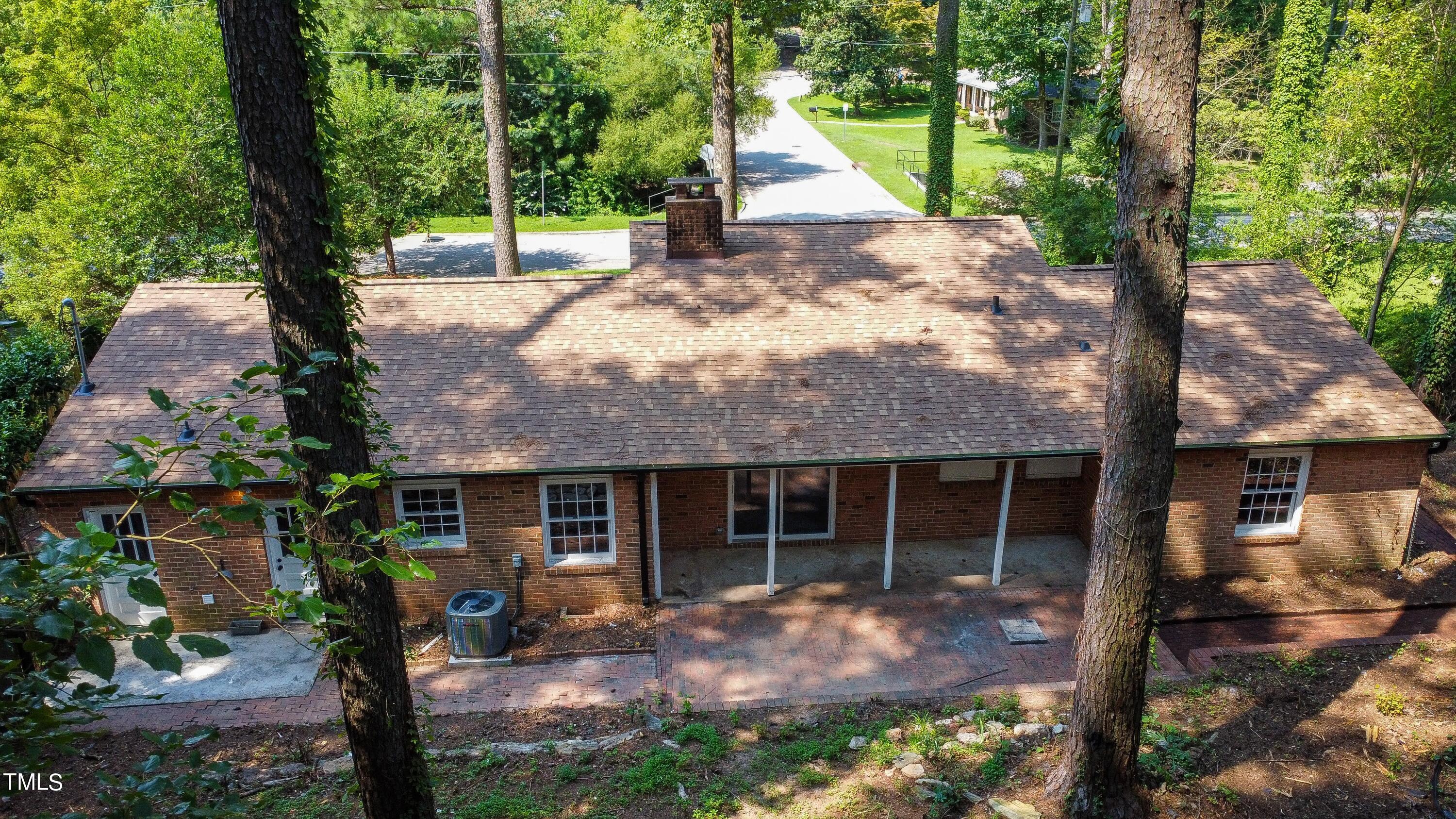 3512 Swift Drive Raleigh, NC 27606 - Photo 30 of 35 a view of a house with backyard and sitting area