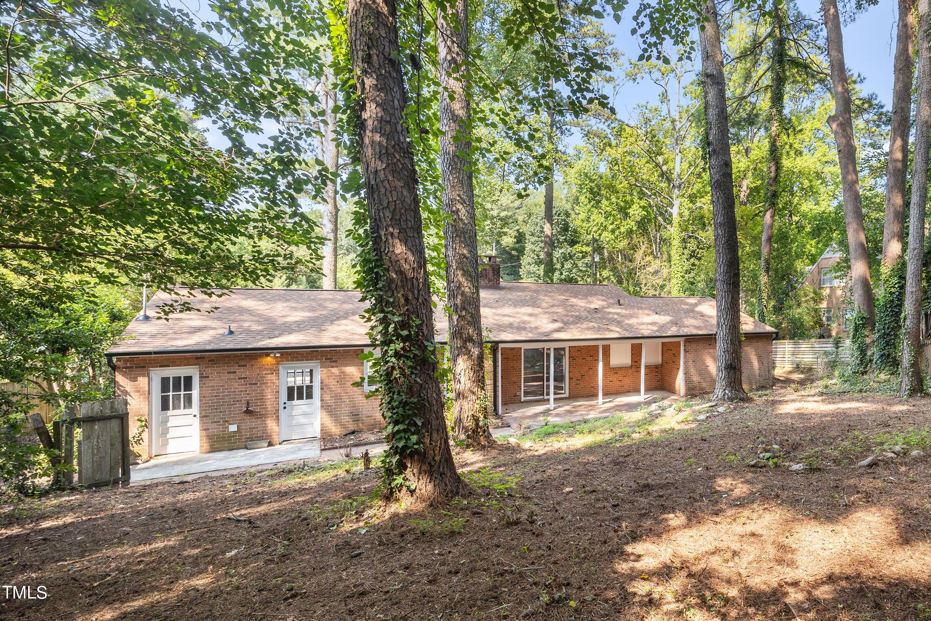 3512 Swift Drive Raleigh, NC 27606 - Photo 35 of 35 a view of a yard in front of a house