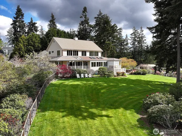 a view of a house with a big yard