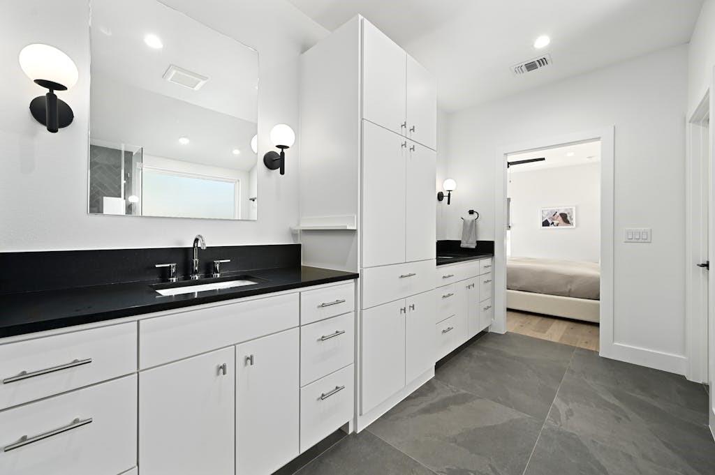 5212 Huisache Street, Unit 2 Austin, TX 78751 - Photo 22 of 30 Full bath featuring vanity, ensuite bath, and recessed lighting