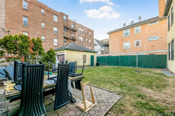 a view of a backyard with a garden and plants