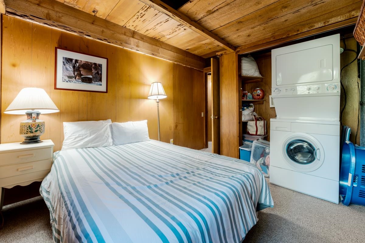 1650 Upper Bench Road Alpine Meadows, CA 96146 - Photo 13 of 21 a bedroom with a bed and a lamp