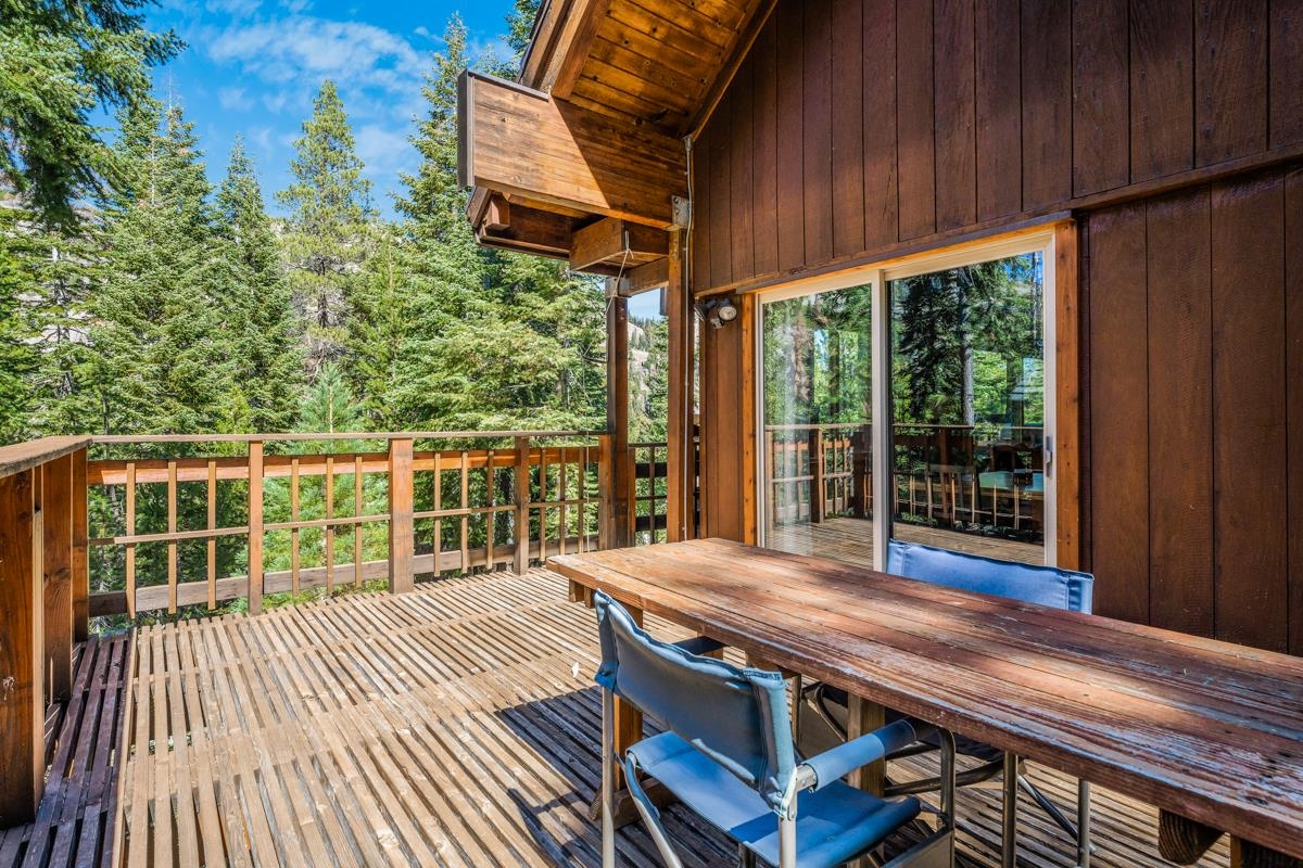 1650 Upper Bench Road Alpine Meadows, CA 96146 - Photo 20 of 21 a view of balcony with wooden floor and outdoor seating