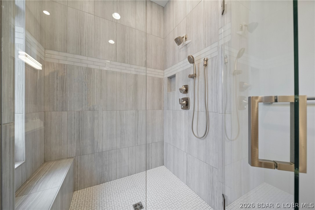 777 Malibu Road Osage Beach, MO 65065 - Photo 52 of 100 A sleek spacious tile shower creates a spa like fe