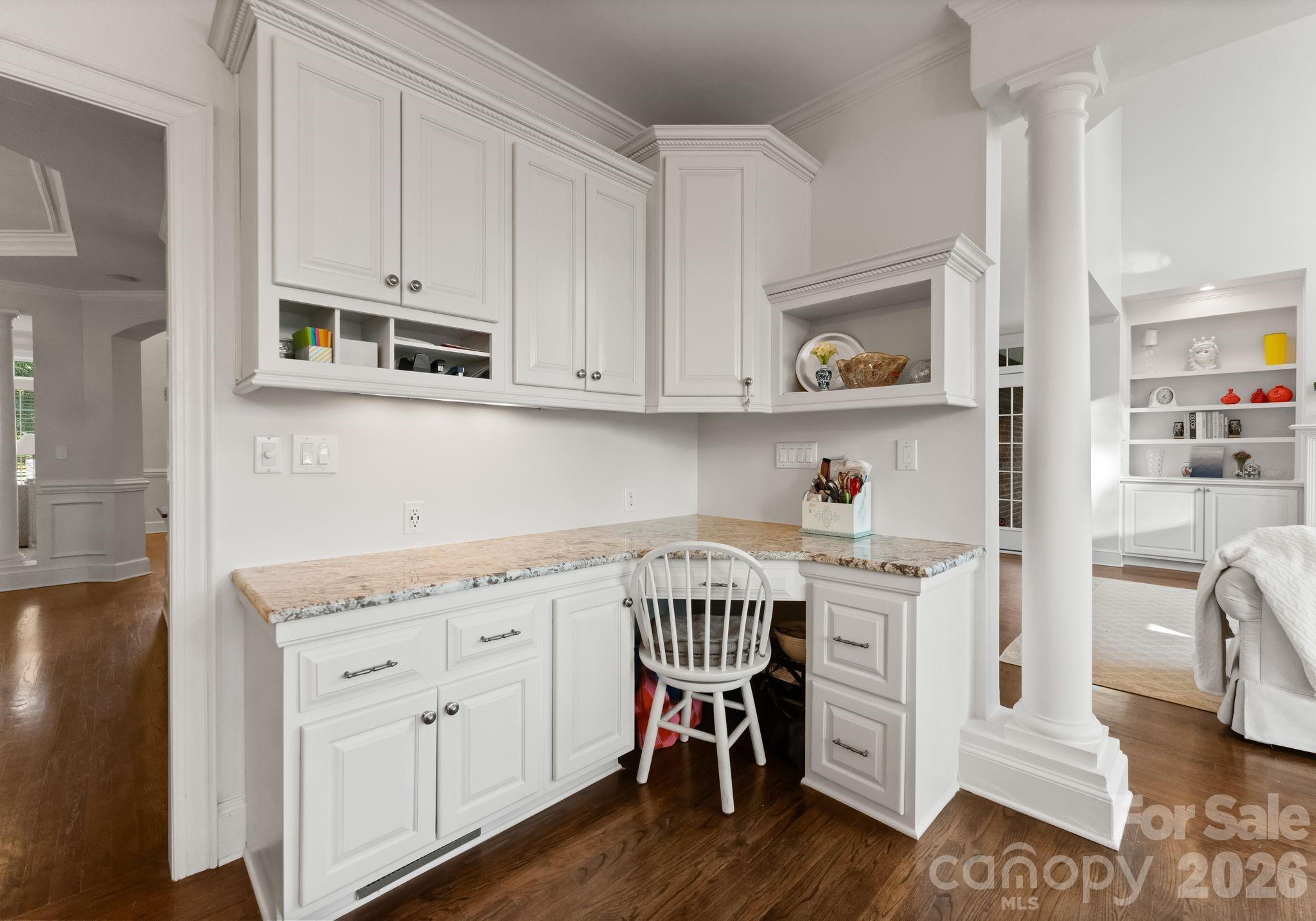 15705 Knox Hill Road Huntersville, NC 28078 - Photo 14 of 48 a view of cabinets a oven and a dining table with wooden floor