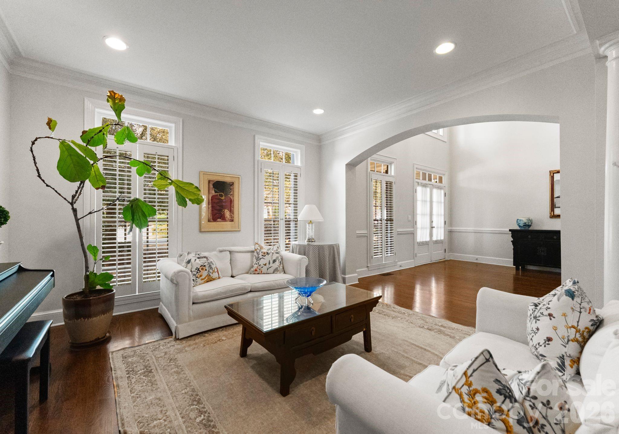 15705 Knox Hill Road Huntersville, NC 28078 - Photo 17 of 48 a living room with furniture and a potted plant