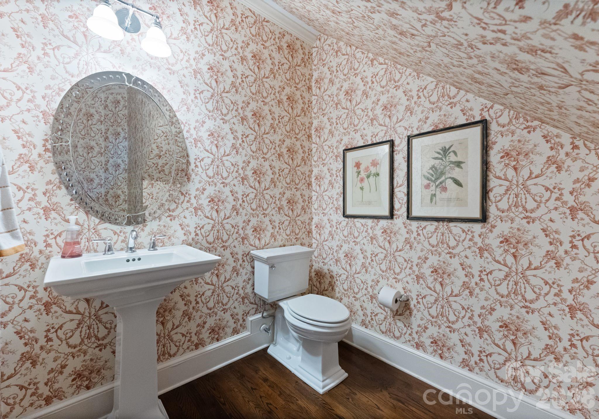 15705 Knox Hill Road Huntersville, NC 28078 - Photo 18 of 48 a bathroom with a toilet sink and mirror