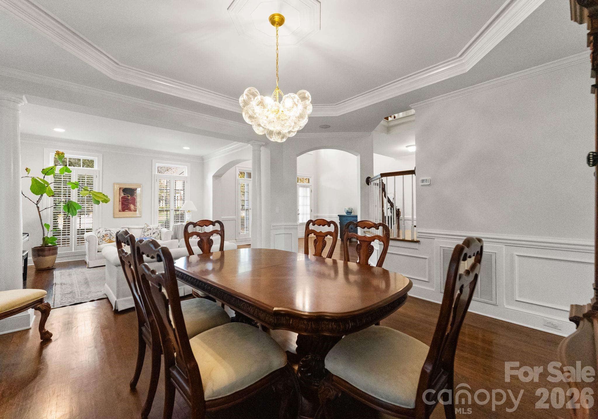 15705 Knox Hill Road Huntersville, NC 28078 - Photo 19 of 48 a view of a dining room and chandelier