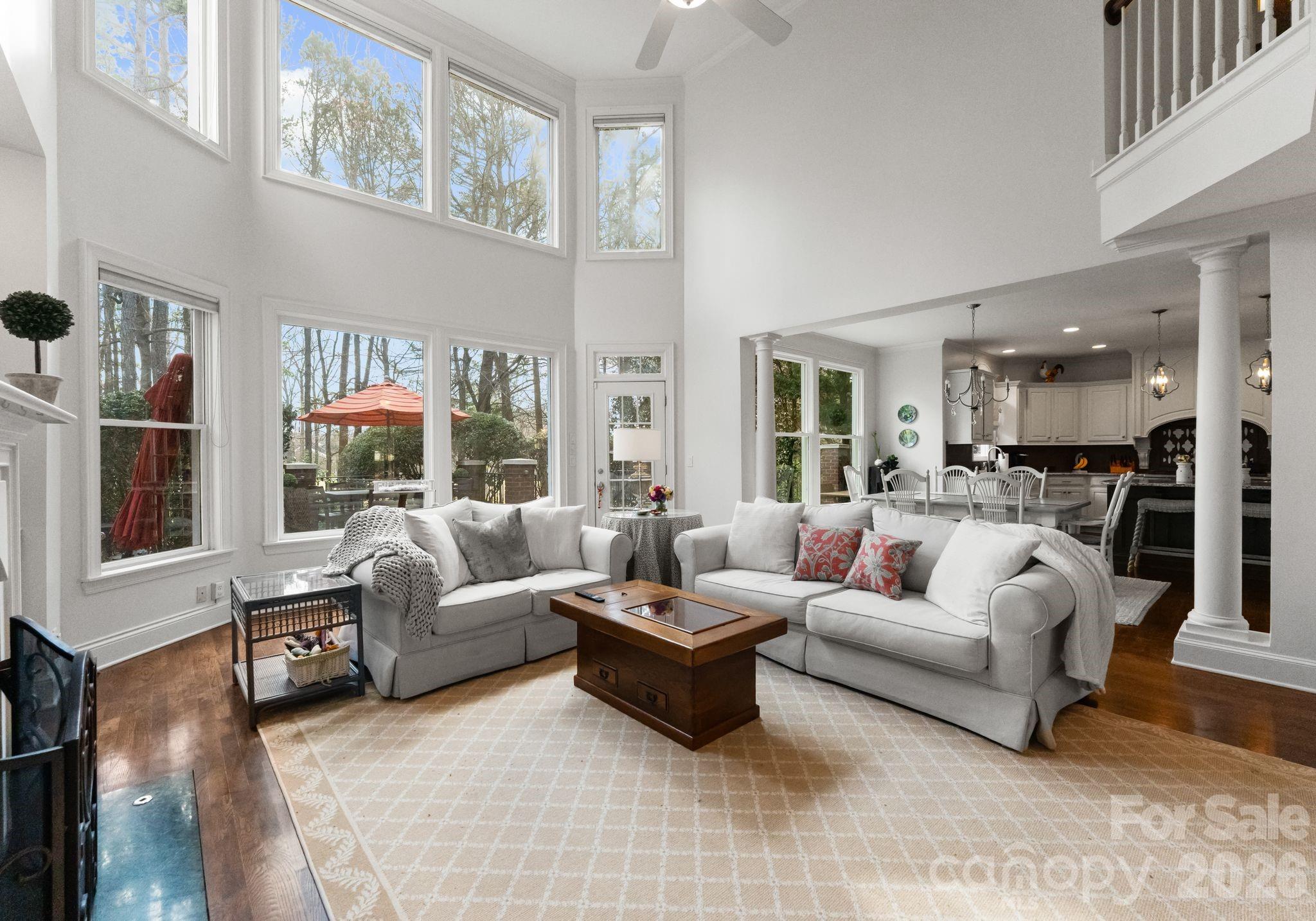 15705 Knox Hill Road Huntersville, NC 28078 - Photo 20 of 48 a living room with furniture and a large window
