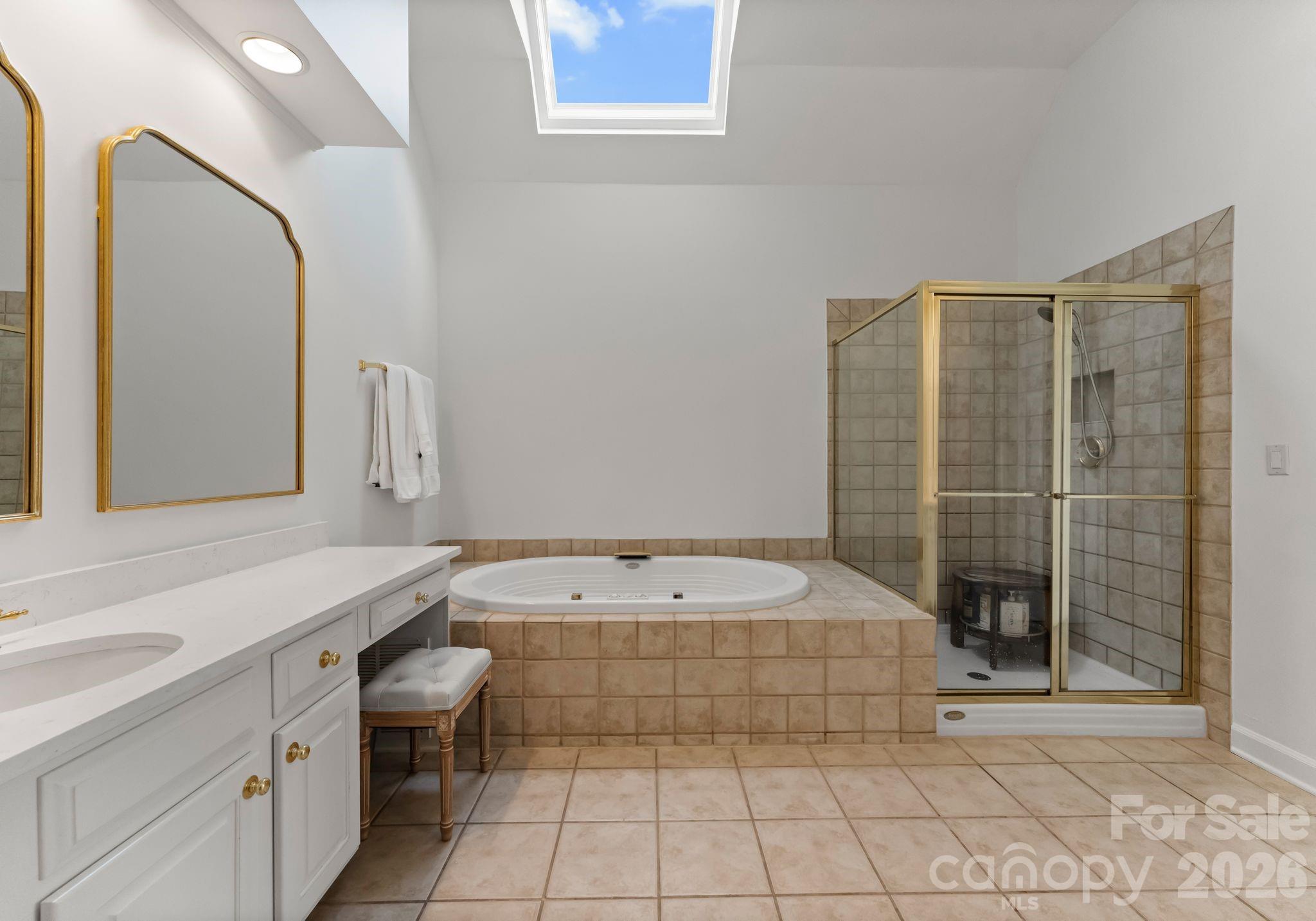 15705 Knox Hill Road Huntersville, NC 28078 - Photo 26 of 48 a bathroom with a sink and a mirror