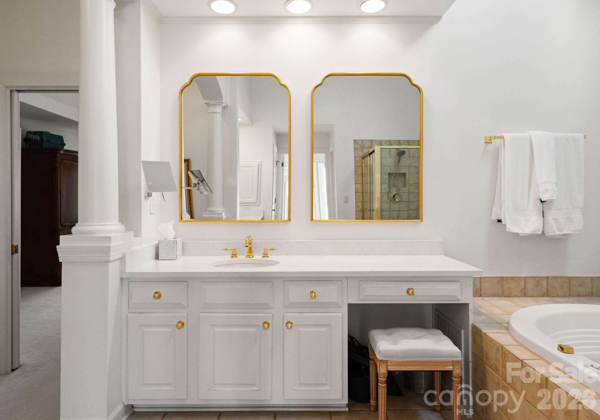 15705 Knox Hill Road Huntersville, NC 28078 - Photo 27 of 48 a bathroom with a sink and a mirror