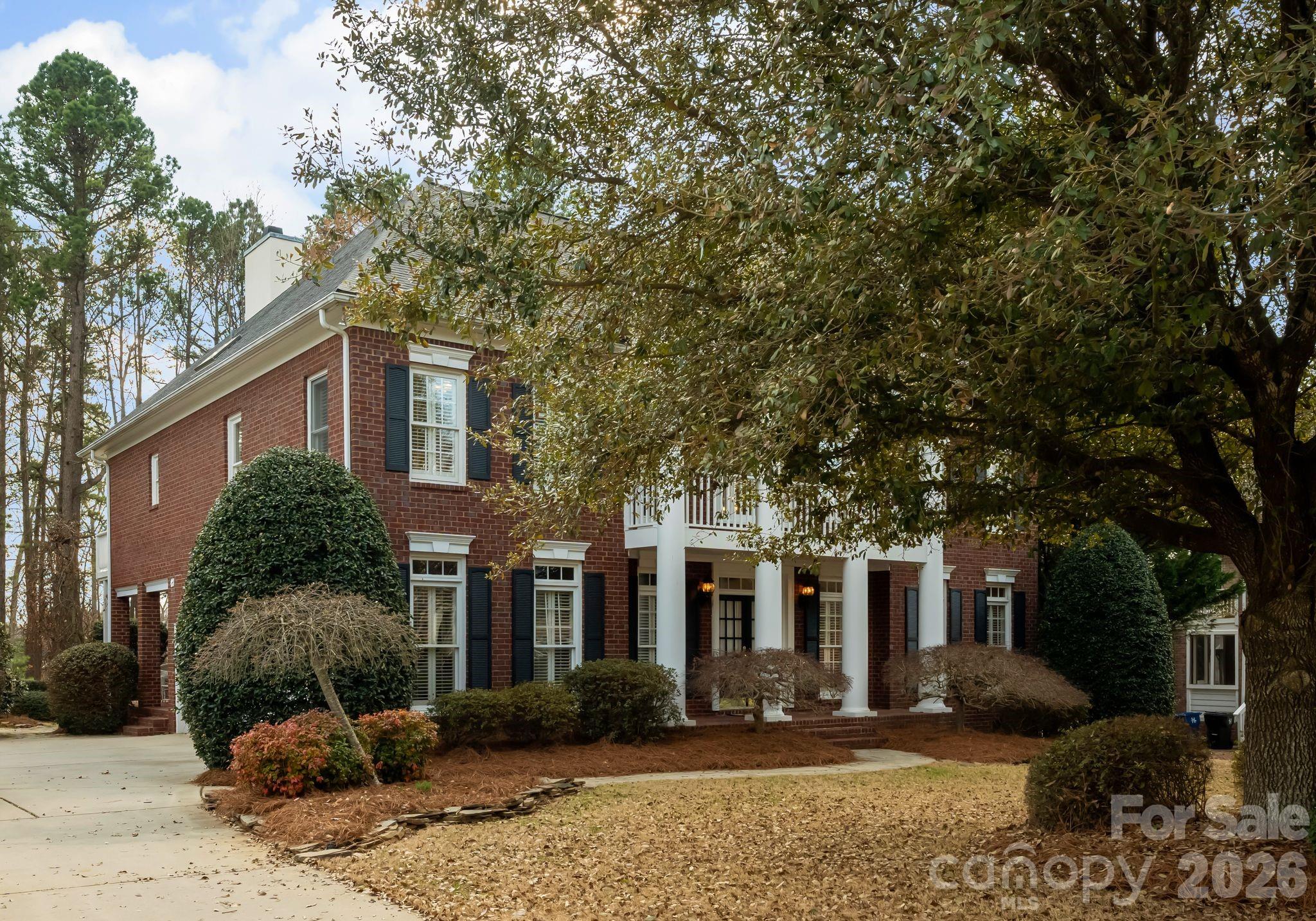 15705 Knox Hill Road Huntersville, NC 28078 - Photo 3 of 48 a front view of a house with garden