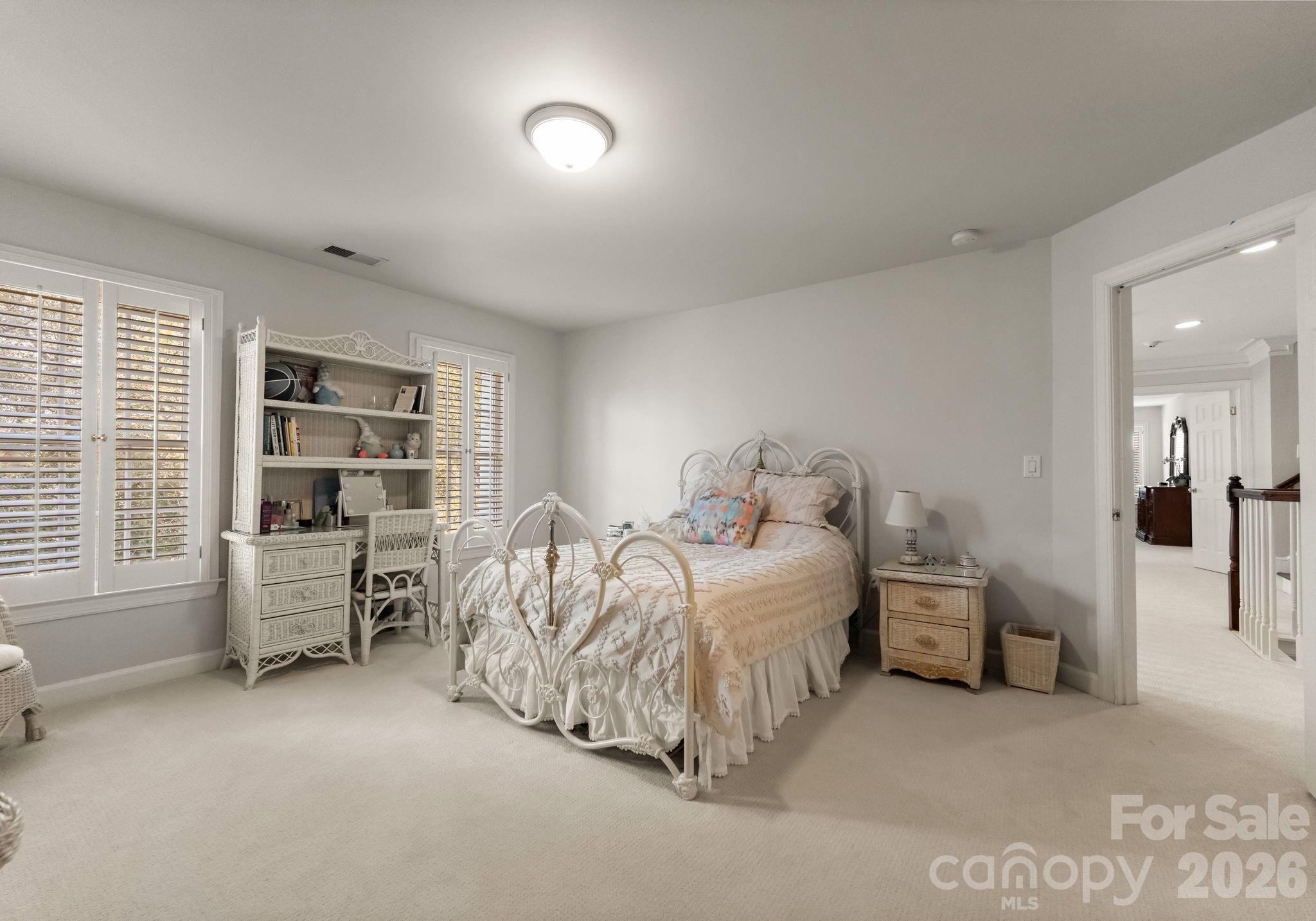 15705 Knox Hill Road Huntersville, NC 28078 - Photo 32 of 48 a bedroom with bed and a large window