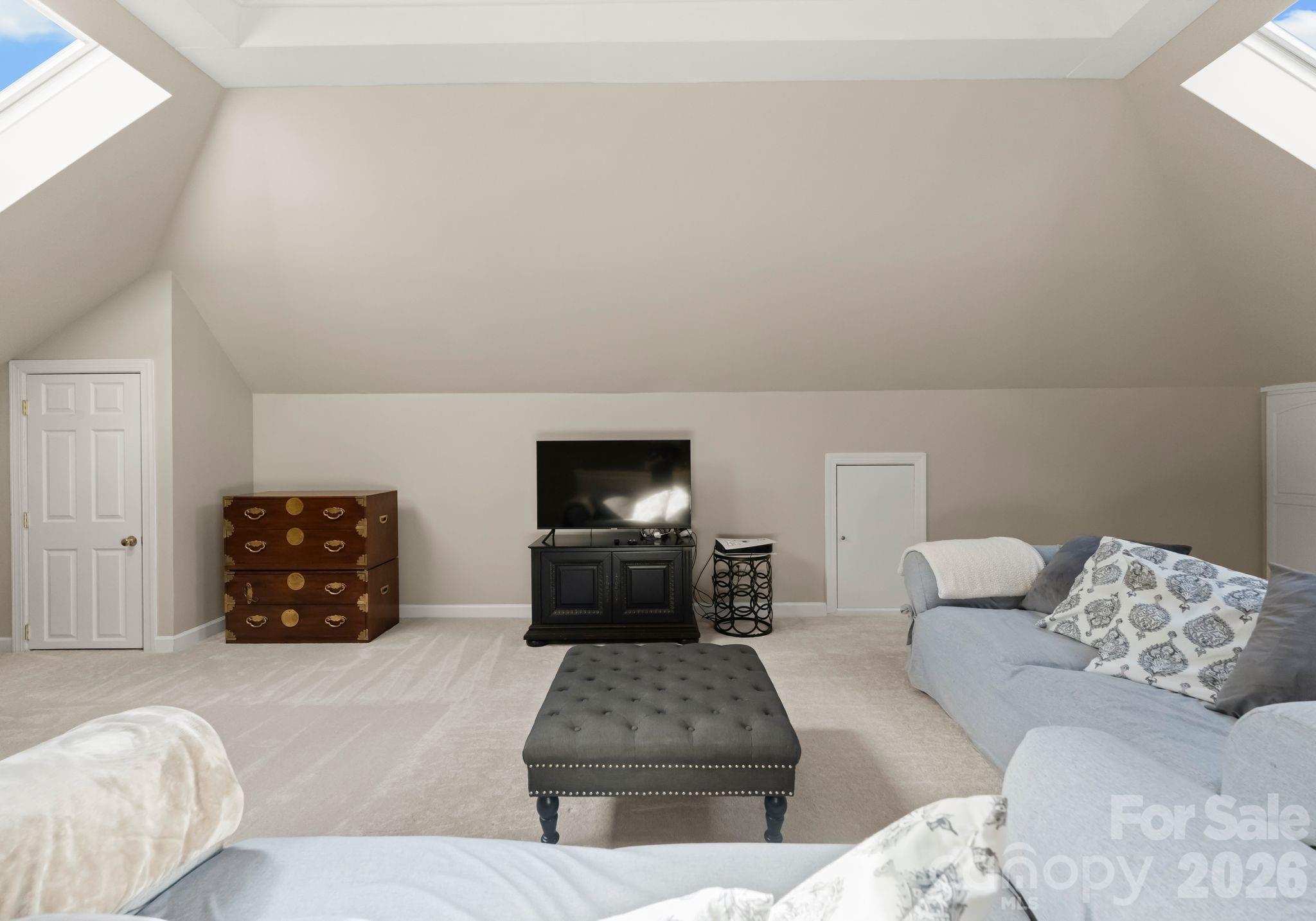 15705 Knox Hill Road Huntersville, NC 28078 - Photo 36 of 48 a living room with furniture and a couch