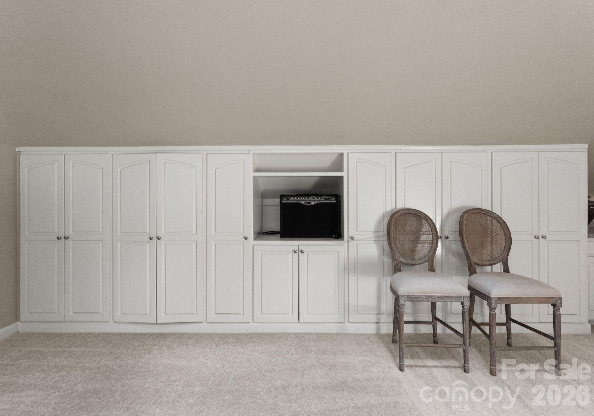 15705 Knox Hill Road Huntersville, NC 28078 - Photo 38 of 48 a view of livingroom with furniture wooden floor and cabinet