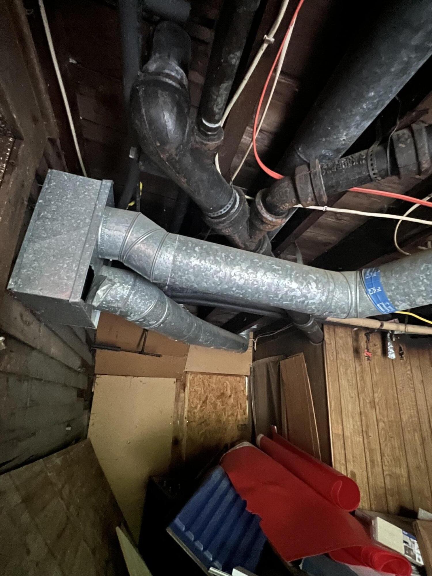 360 Water Street Ellsworth, ME 04605 - Photo 34 of 39 lower level duct work, plumbing and wiri