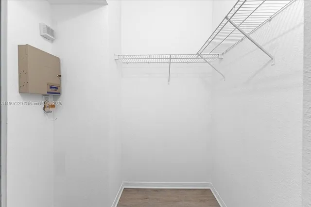 a view of small space with racks on the wall