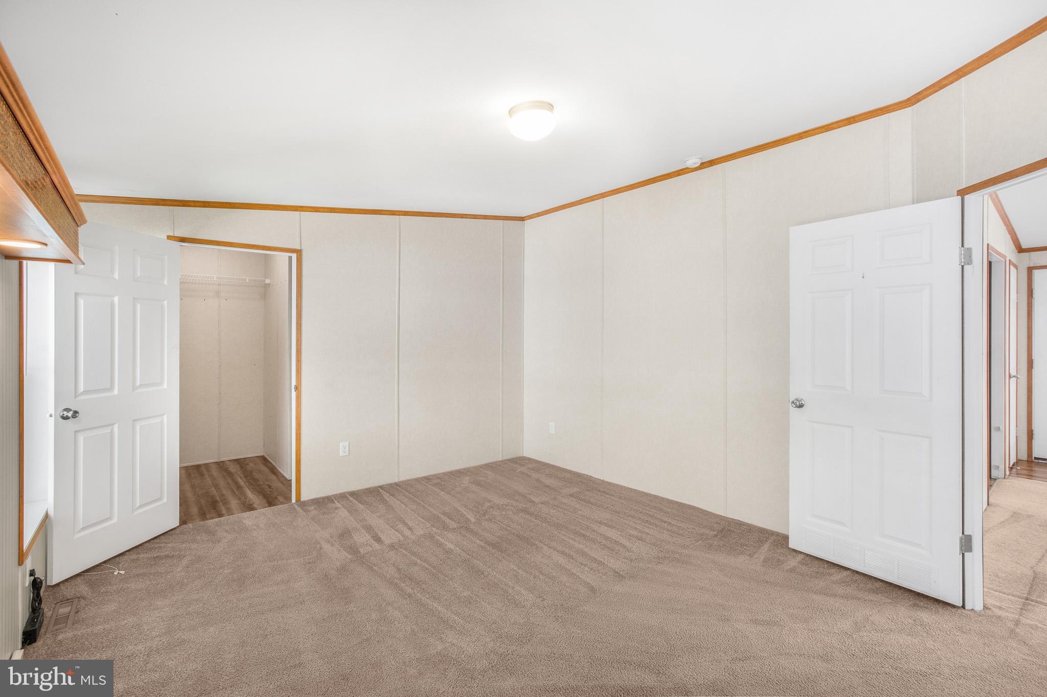 199 Boones Drive Lothian, MD 20711 - Photo 8 of 31 Primary Bedroom view from ensuite door