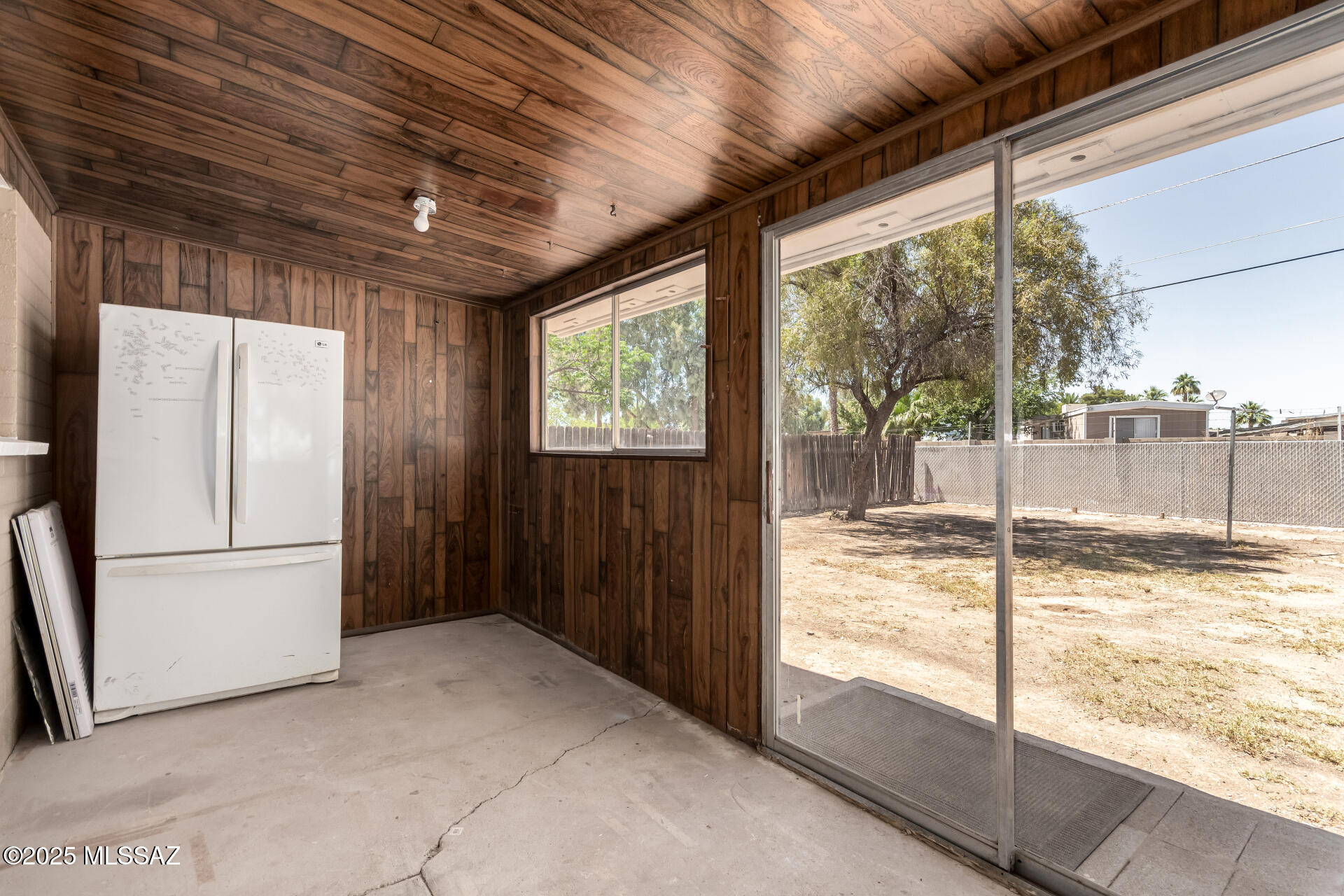 1214 West Kleindale Road Tucson, AZ 85705 - Photo 26 of 33 Sunroom with mini-split & laundry