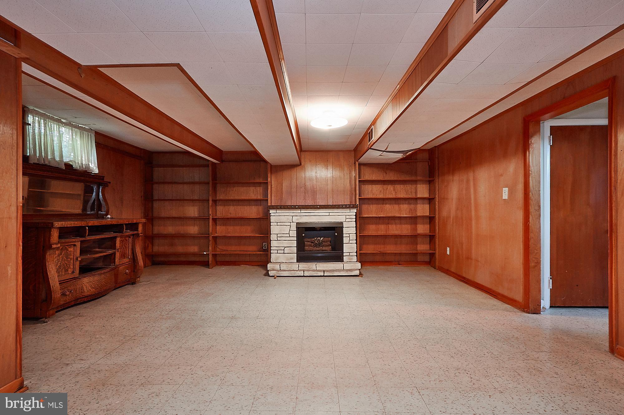 25625 Ridge Road Damascus, MD 20872 - Photo 14 of 18 Rec room, painted paneling here would be nice.