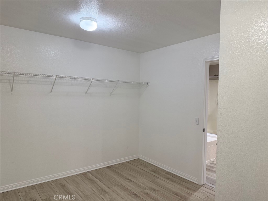4547 Nicole Way Riverside, CA 92501 - Photo 27 of 36 a view of a room with empty racks on the wall
