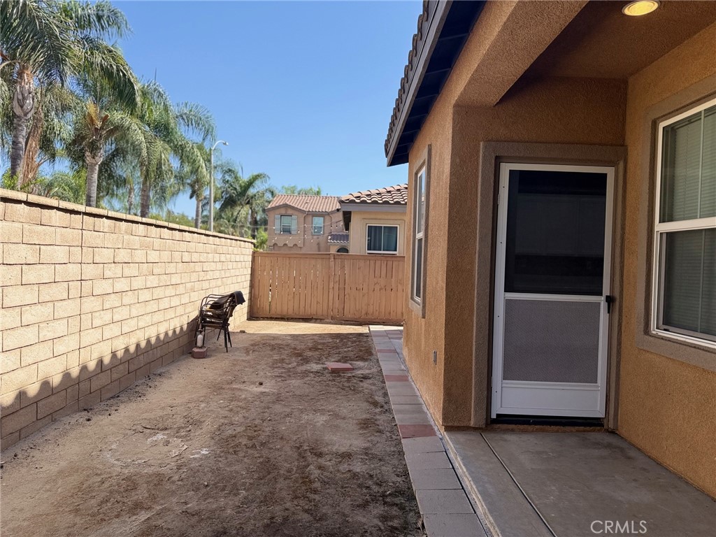 4547 Nicole Way Riverside, CA 92501 - Photo 35 of 36 a view of a house with a backyard