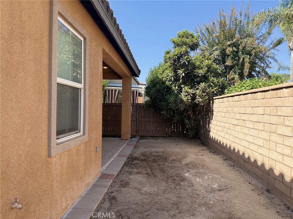 4547 Nicole Way Riverside, CA 92501 - Photo 36 of 36 a view of a house with a yard