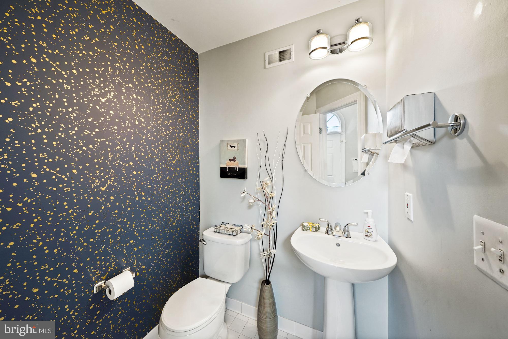 123 Roland Court Southwest Vienna, VA 22180 - Photo 17 of 34 Powder room off entry hall, main level