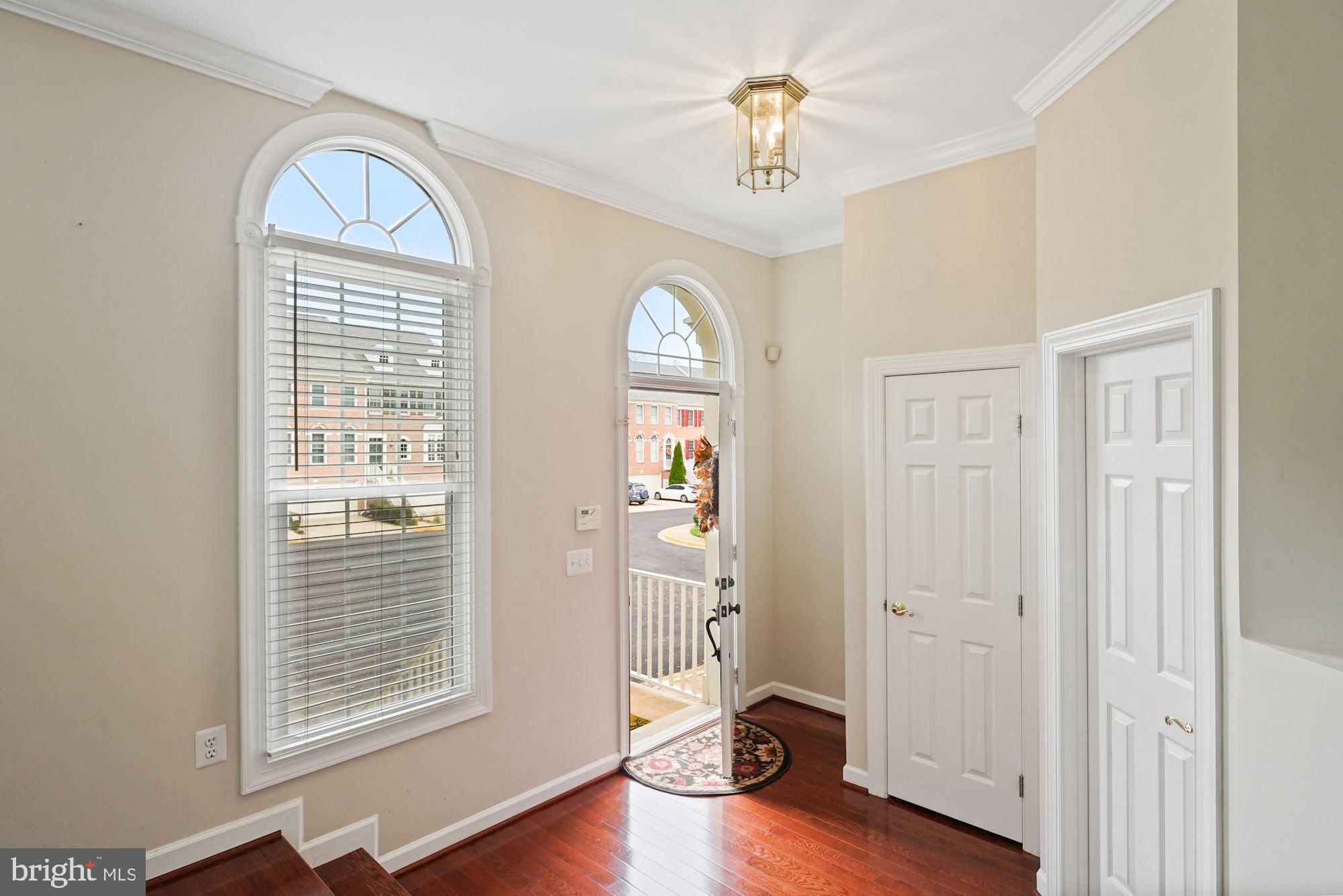123 Roland Court Southwest Vienna, VA 22180 - Photo 3 of 34 Bright entry with coat closet and powder room