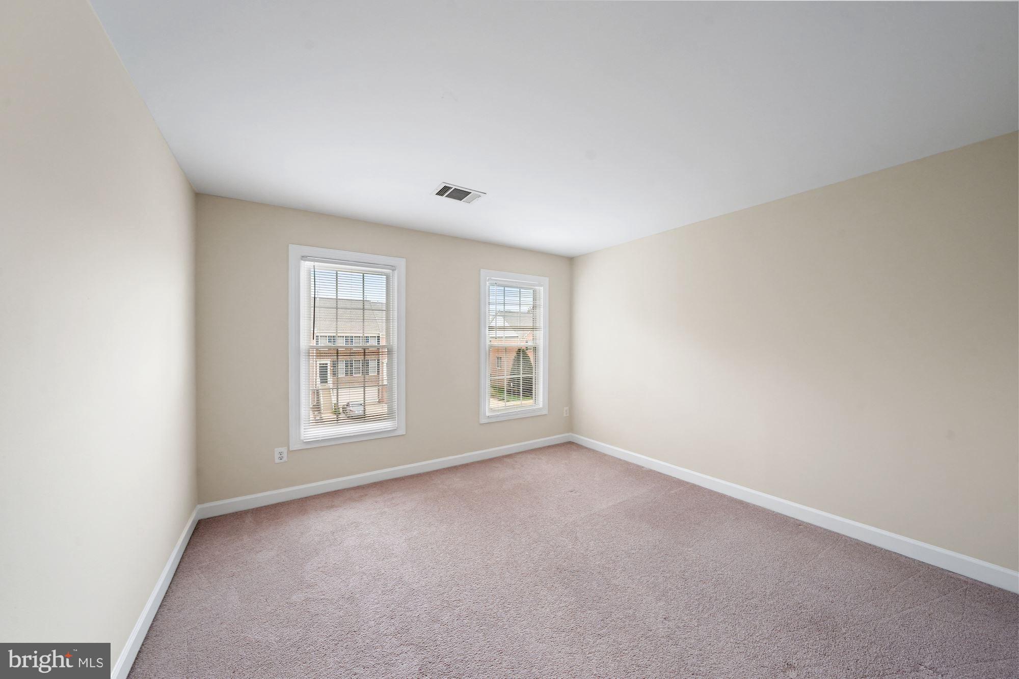 123 Roland Court Southwest Vienna, VA 22180 - Photo 23 of 34 Two other spacious bedrooms upstairs