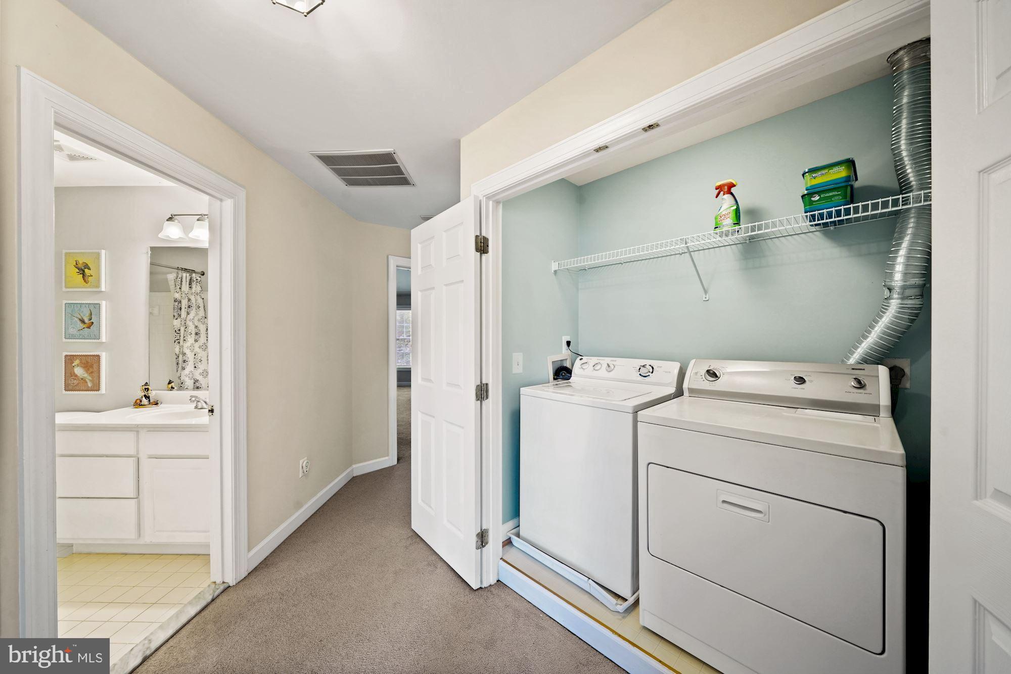 123 Roland Court Southwest Vienna, VA 22180 - Photo 26 of 34 Laundry closet on bedroom level