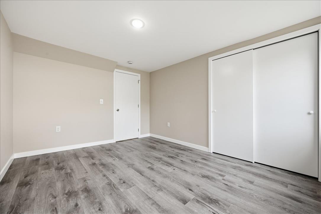 5641 North Coplay Road Whitehall, PA 18052 - Photo 37 of 68 Wood-look flooring and a functional closet maximize this versatile room.