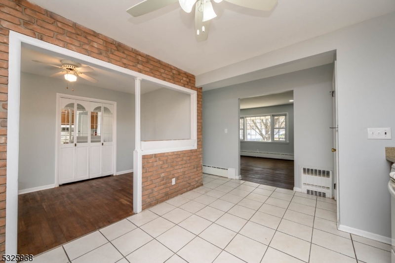 136 Valpeck Avenue, Unit 1 Raritan, NJ 08869 - Photo 12 of 37 a view of an entryway and an empty room