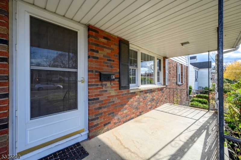 136 Valpeck Avenue, Unit 1 Raritan, NJ 08869 - Photo 2 of 37 a outdoor space of a house with barbeque oven