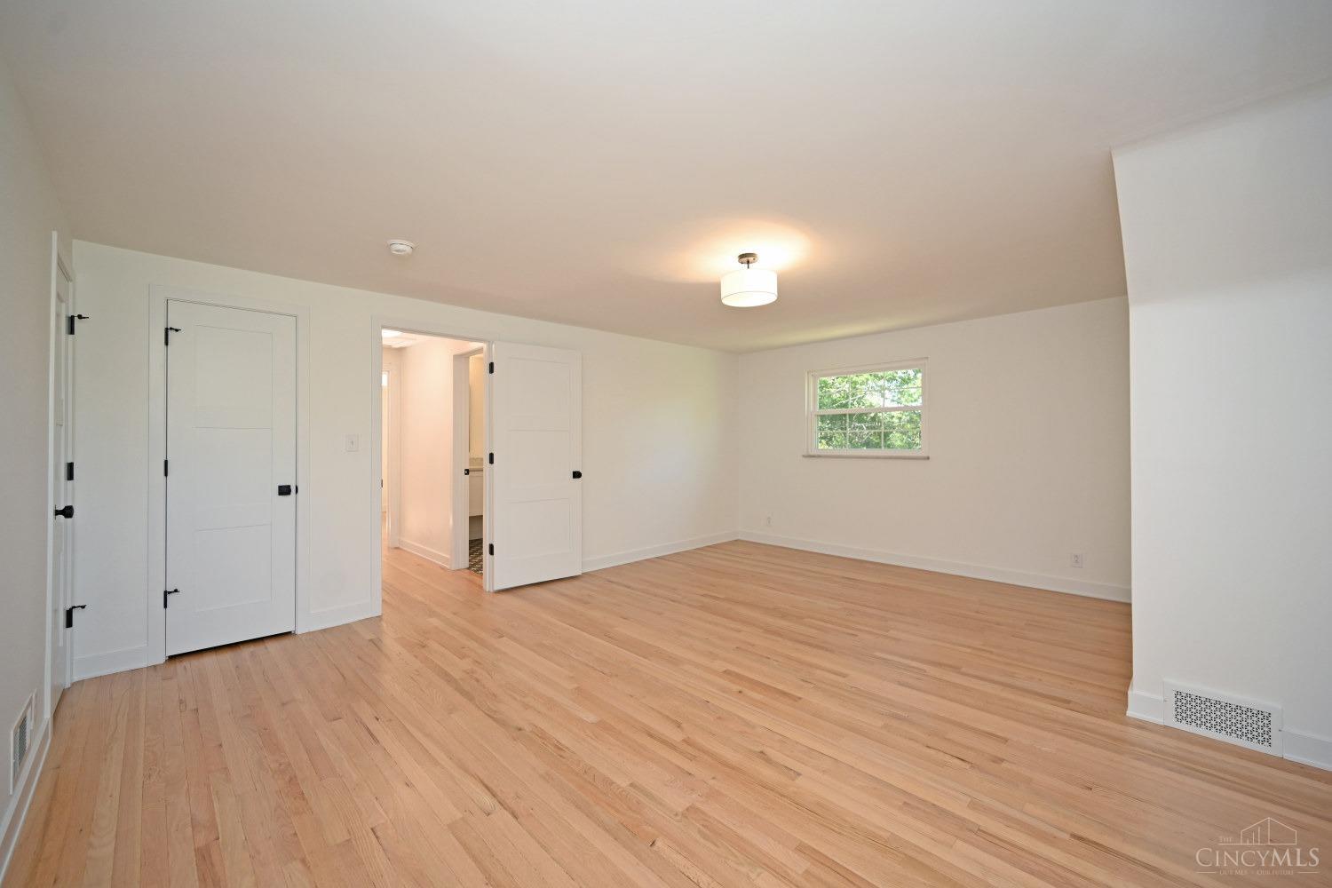 7083 Paddison Road Cincinnati, OH 45230 - Photo 48 of 78 18 x 15 2nd floor bedroom. Features ample storage, new doors, trim & hardware.