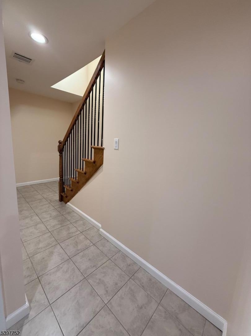 208 Walnut Street Newark, NJ 07105 - Photo 13 of 18 a view of entryway and hall with a window