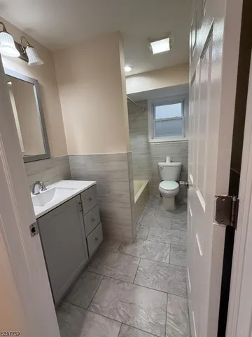 a view of a bathroom with a sink and a toilet