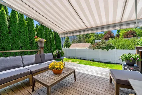 a view of a patio with chair and table of the garden