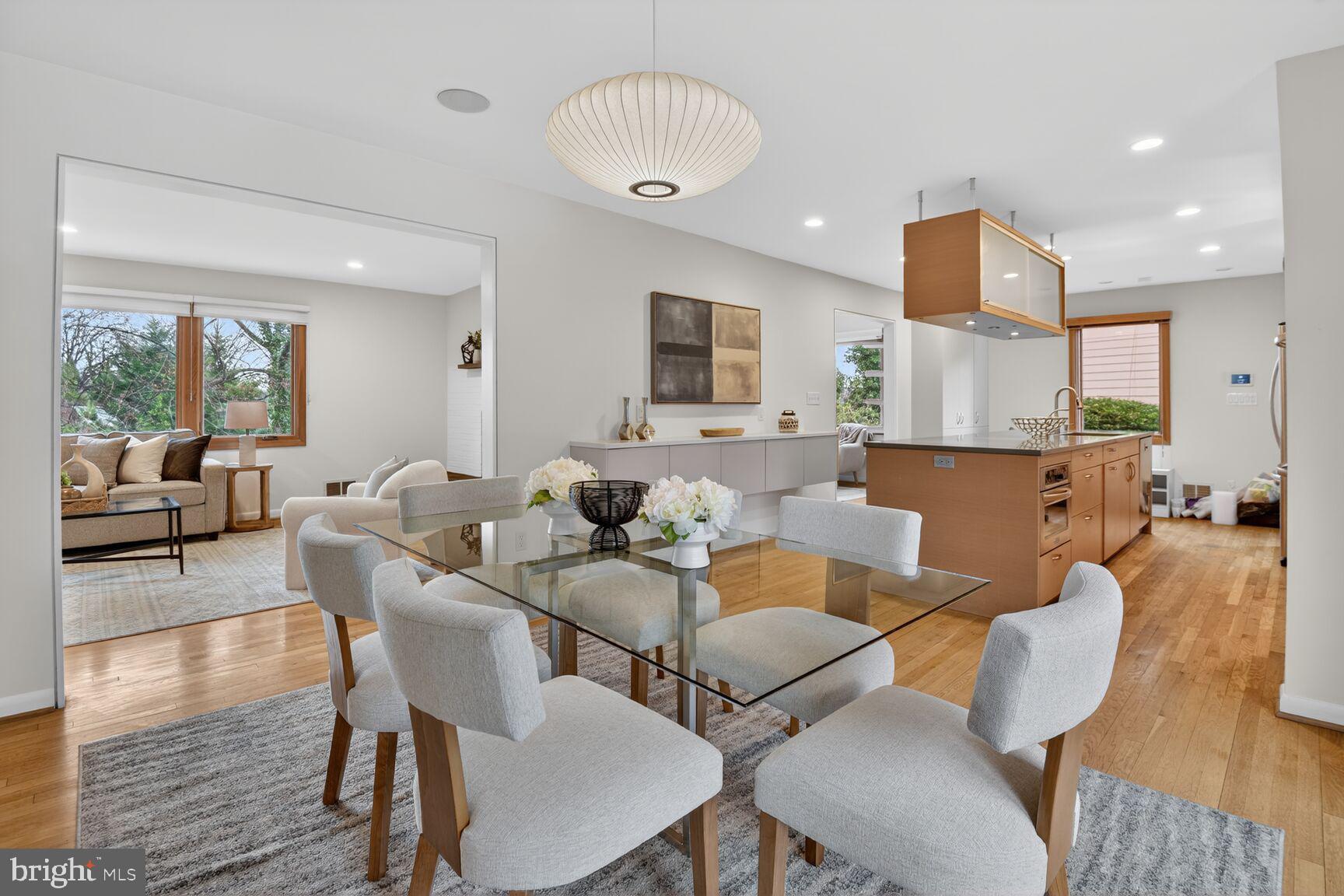 6104 Robinwood Road Bethesda, MD 20817 - Photo 15 of 45 a view of a dining room with furniture