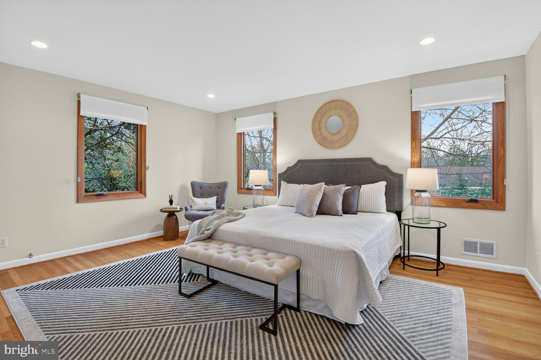 6104 Robinwood Road Bethesda, MD 20817 - Photo 22 of 45 a bedroom with a bed lamp and a window